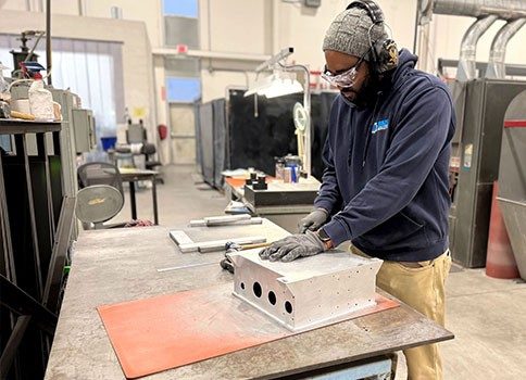 Gastops employees on the manufacturing floor