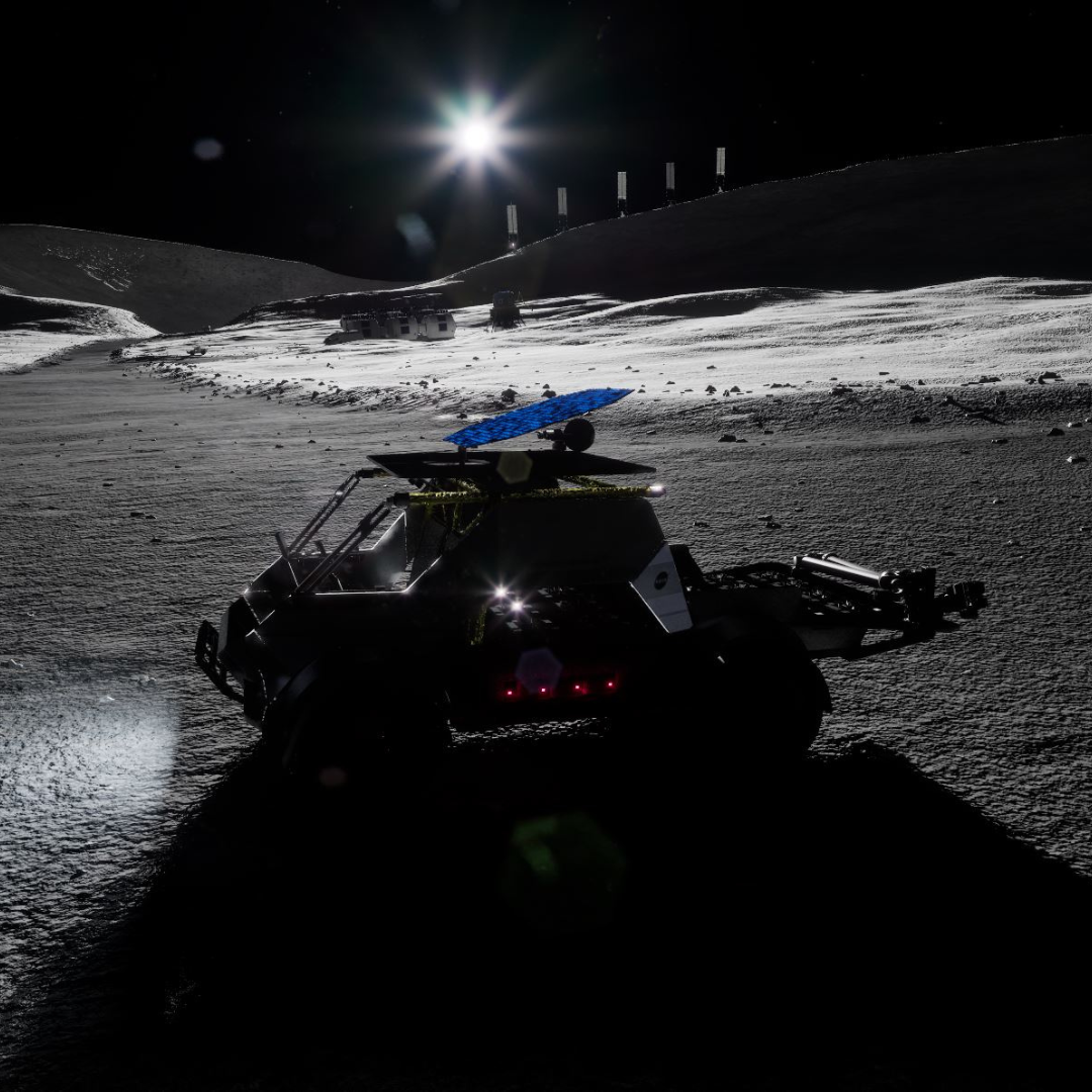 futuristic render of the lunar mobility vehicle driving across the moon’s surface